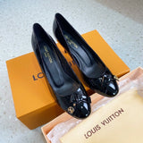 Front view of Louis Vuitton luxury piece style No.163