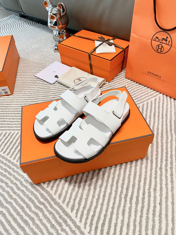 Hermès Black Crisscross Strap Sandals - Angled View