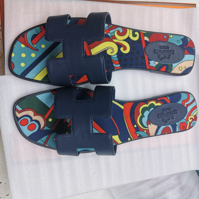Hermes sandals Style 023 - angled studio shot