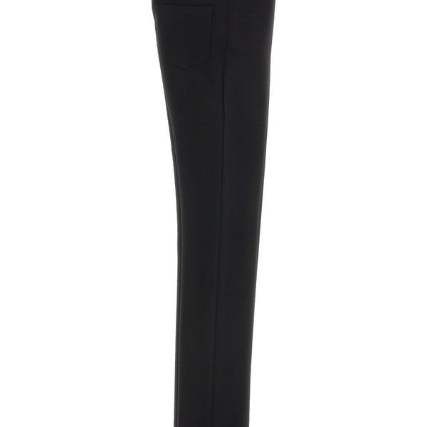 Close-up of Balenciaga pants hardware and fine stitching