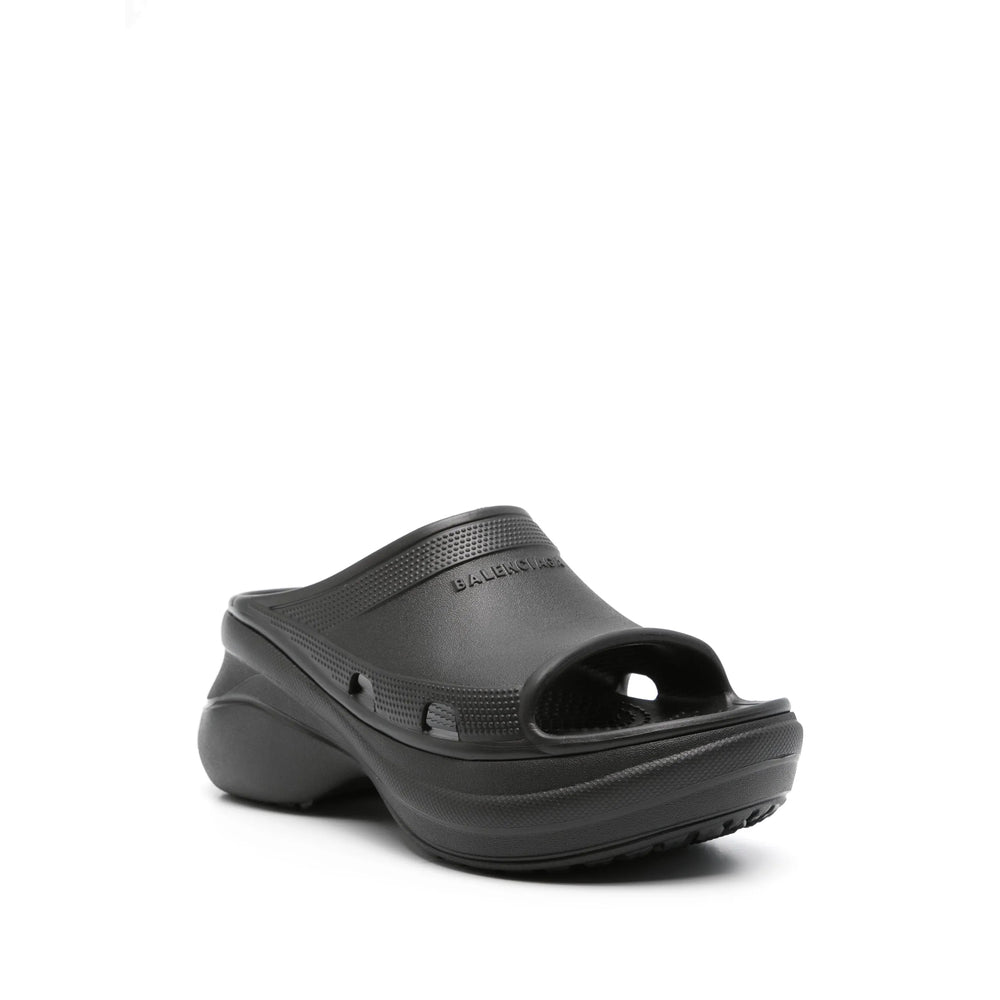 Close-up of Balenciaga sandals hardware and fine stitching