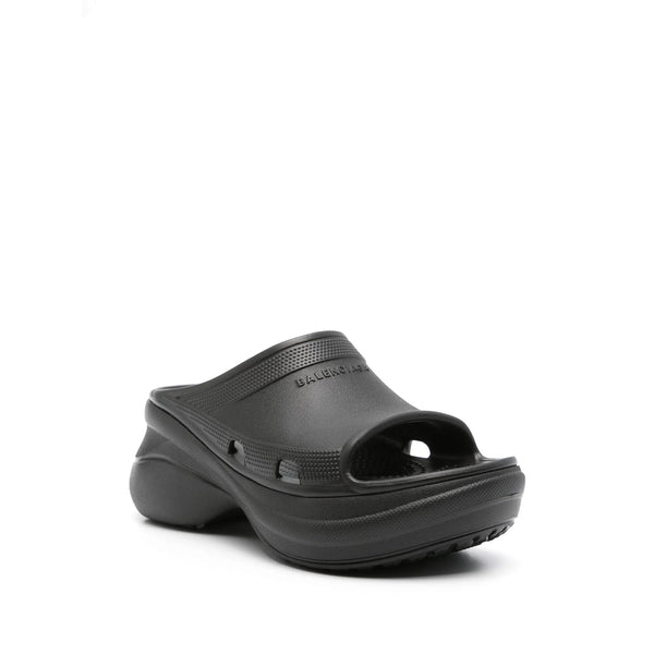 Close-up of Balenciaga sandals hardware and fine stitching