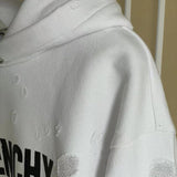 Three-quarter angle view of Givenchy luxury piece style No.115