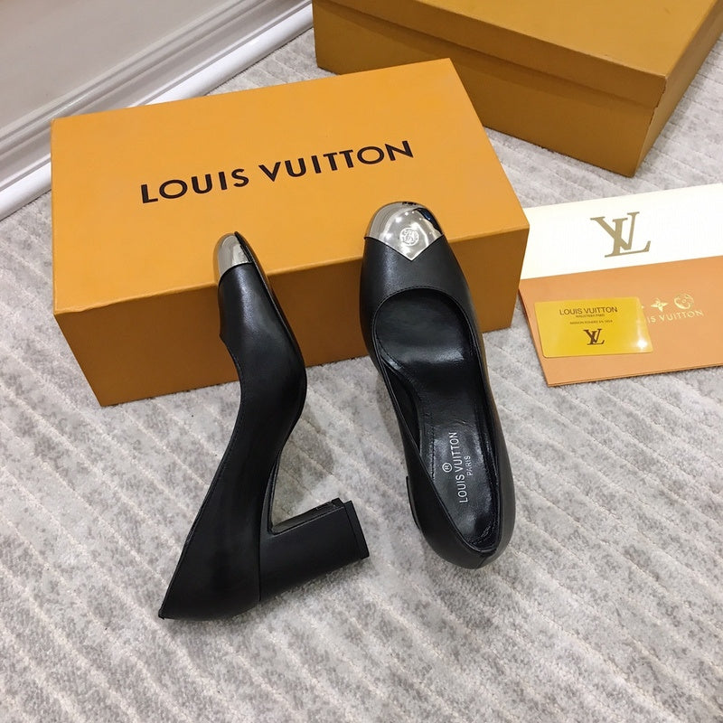 Louis Vuitton White Pointed-Toe Stiletto Heels - Close-Up Texture View