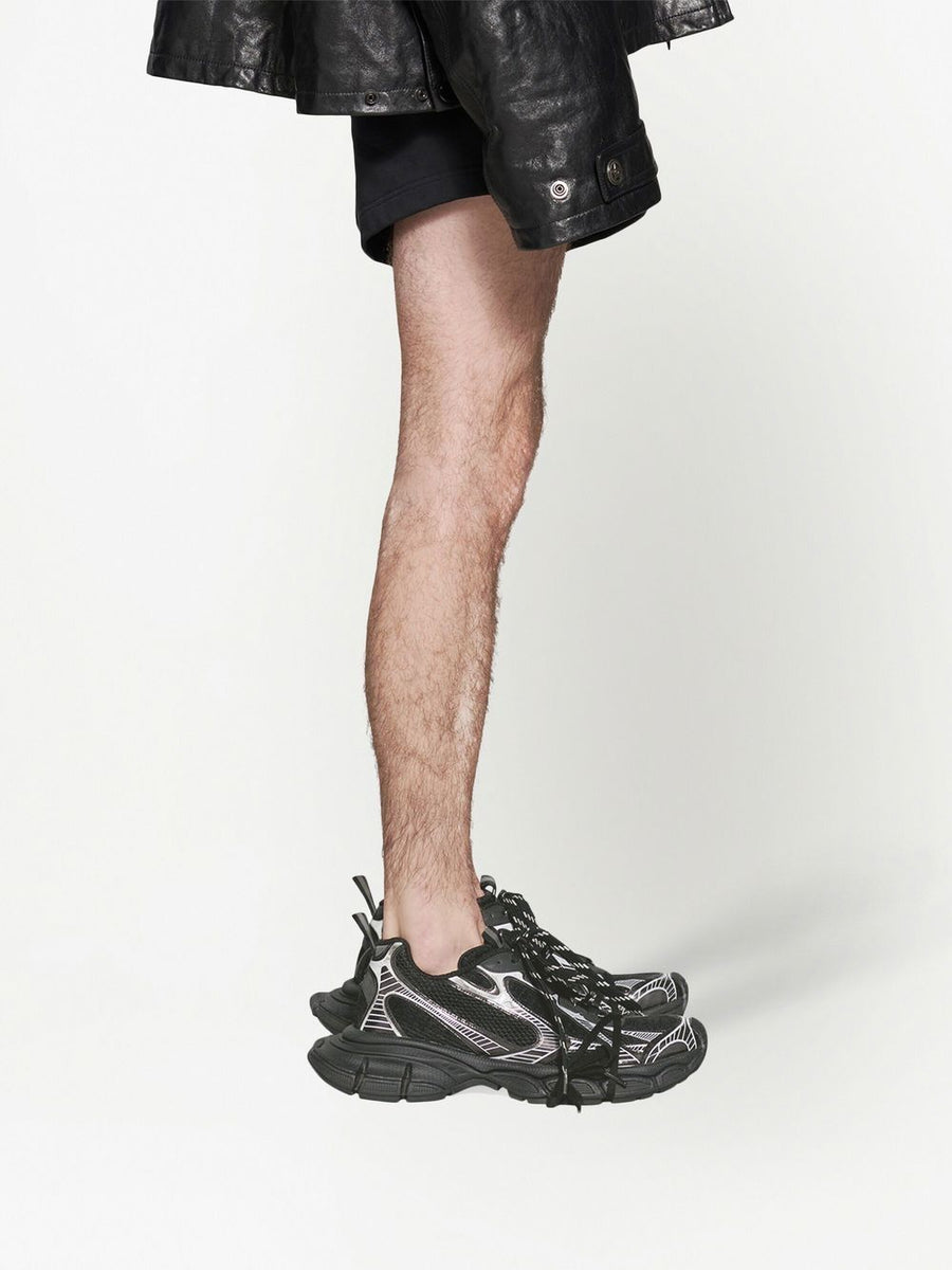 Close-up of Balenciaga sneakers hardware and fine stitching