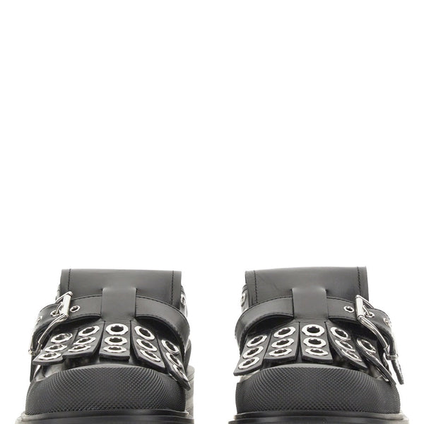 Close-up of Alexander McQueen slides hardware and fine stitching