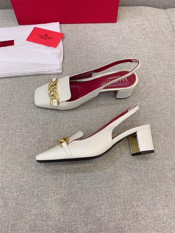 Three-quarter angle view of Valentino Garavani luxury piece style No.194