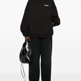 Close-up of Balenciaga jerseys & knitwear hardware and fine stitching
