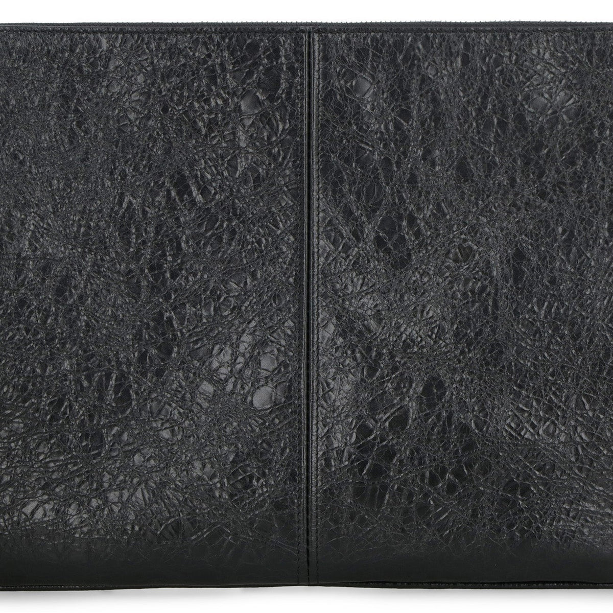 Close-up of Balenciaga pochettes hardware and fine stitching