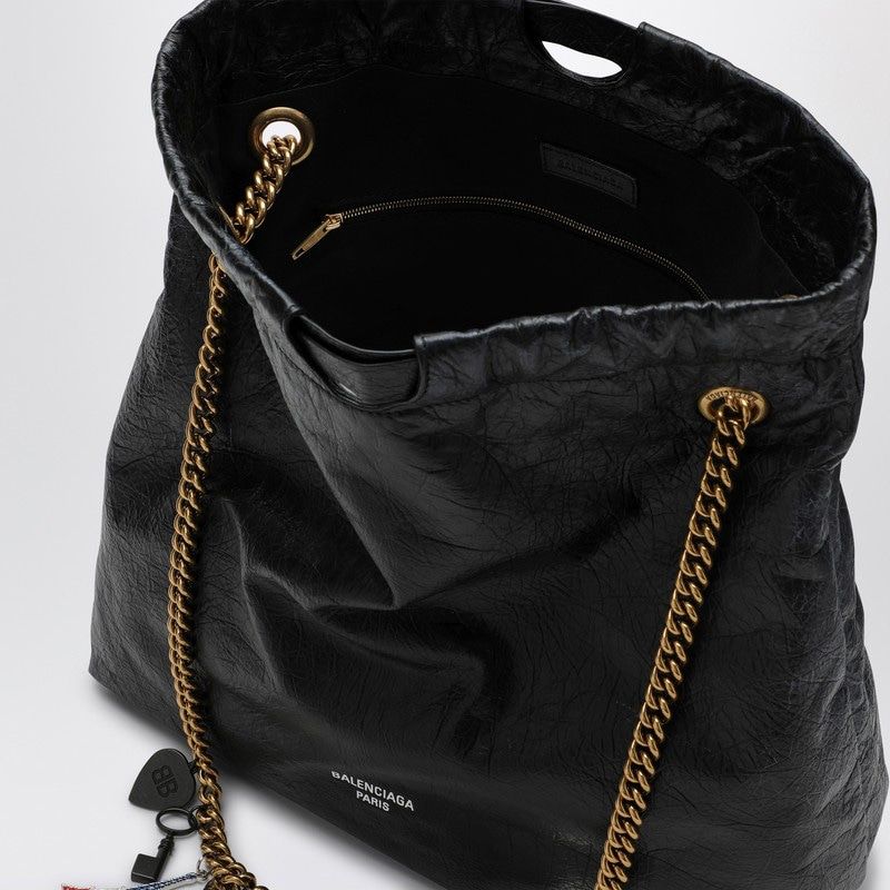 Close-up of Balenciaga totes hardware and fine stitching