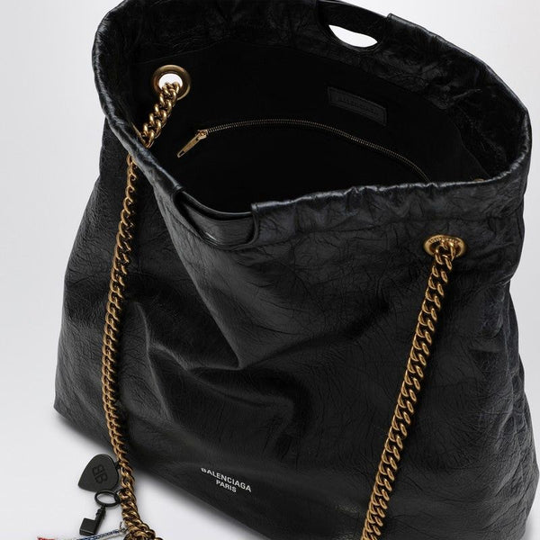 Close-up of Balenciaga totes hardware and fine stitching