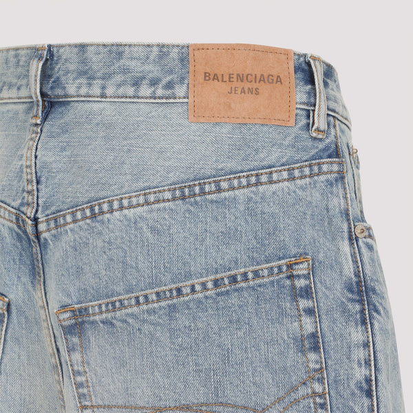 Close-up of Balenciaga pants hardware and fine stitching