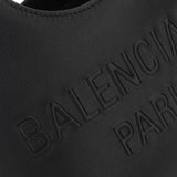 Close-up of Balenciaga totes hardware and fine stitching