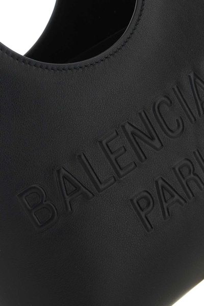 Close-up of Balenciaga totes hardware and fine stitching