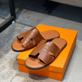 Hermès White Low-Top Sneakers - Angled View