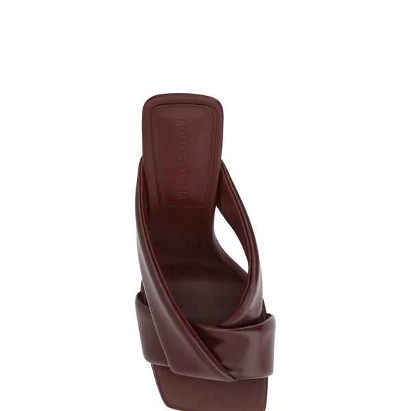 Close-up of Bottega Veneta sandals hardware and fine stitching