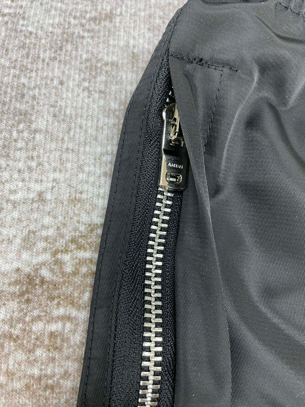 Three-quarter angle view of Amiri luxury piece style No.054