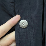 Close-up of Burberry designer clothing craftsmanship