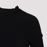 Close-up of Balenciaga dresses hardware and fine stitching