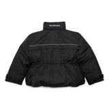 Close-up of Balenciaga outerwear hardware and fine stitching
