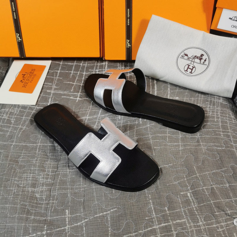 Hermès Tan Flat Thong Sandals - Lifestyle Styling Shot