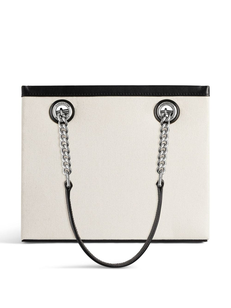 Close-up of Balenciaga handbags hardware and fine stitching