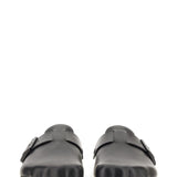 Close-up of Balenciaga sandals hardware and fine stitching