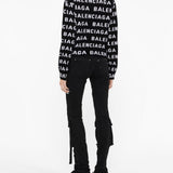 Close-up of Balenciaga jerseys & knitwear hardware and fine stitching