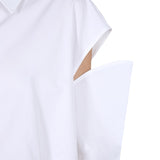 Close-up of Alexander McQueen cocktail dresses hardware and fine stitching