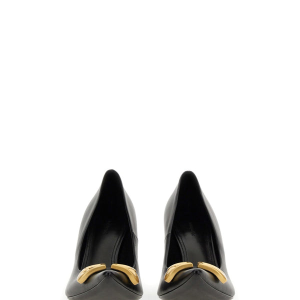Close-up of Balenciaga pumps hardware and fine stitching