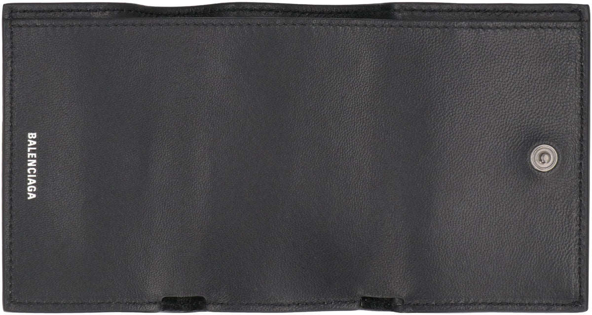 Close-up of Balenciaga small leather goods hardware and fine stitching