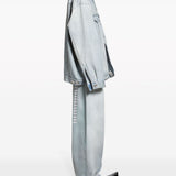 Close-up of Balenciaga outerwear hardware and fine stitching