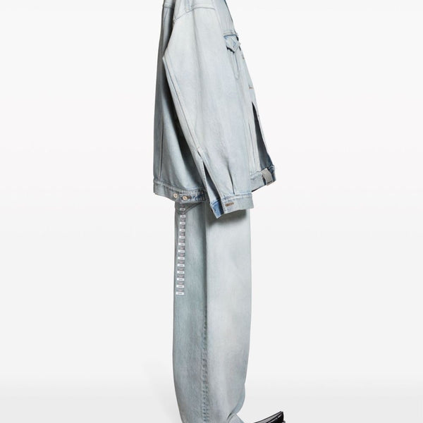 Close-up of Balenciaga outerwear hardware and fine stitching