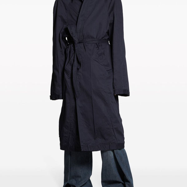 Close-up of Balenciaga outerwear hardware and fine stitching