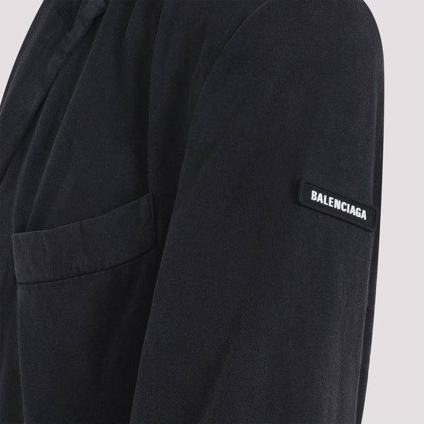 Close-up of Balenciaga outerwear hardware and fine stitching