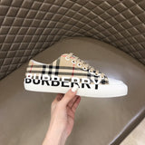 Burberry Chocolate Brown Low-Top Sneakers - Close-Up Texture View