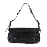 Close-up of Balenciaga handbags hardware and fine stitching