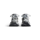 Close-up of Balenciaga sneakers hardware and fine stitching