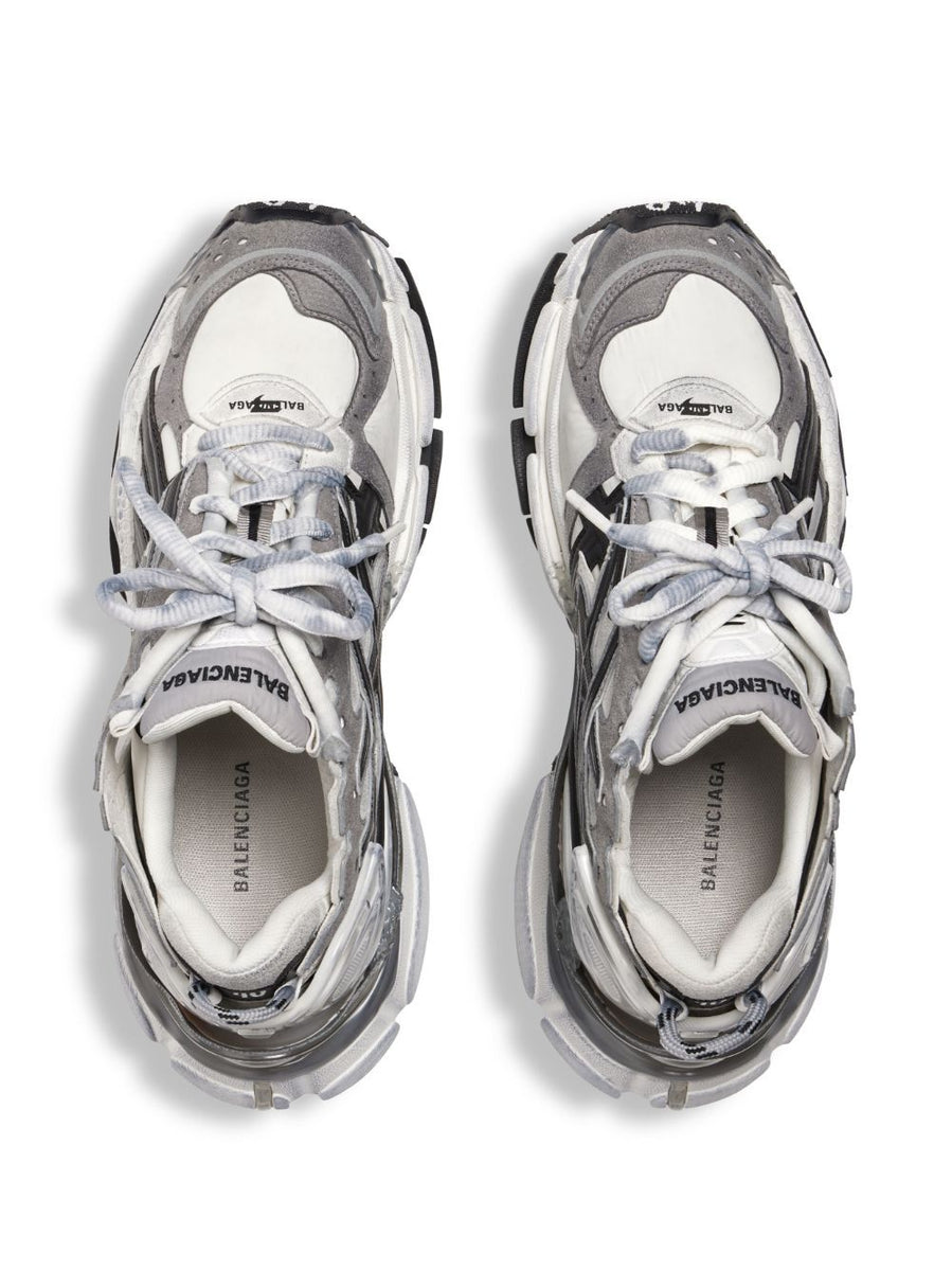 Close-up of Balenciaga sneakers hardware and fine stitching