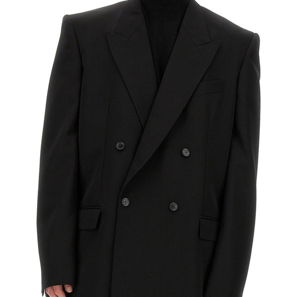 Close-up of Balenciaga outerwear hardware and fine stitching