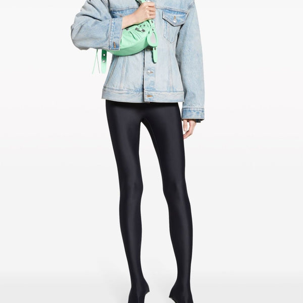 Close-up of Balenciaga outerwear hardware and fine stitching