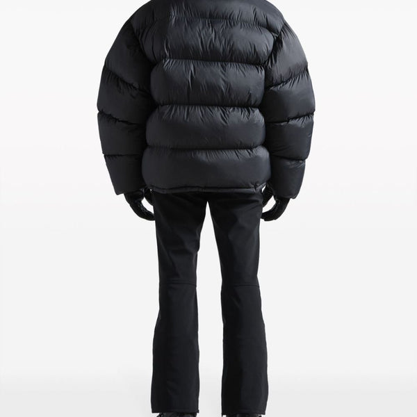 Close-up of Balenciaga pants hardware and fine stitching