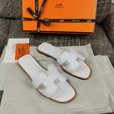Hermès Nude Ankle Strap Sandals - Angled View