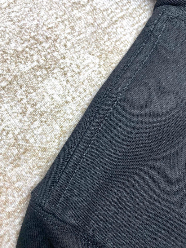 Three-quarter angle view of Amiri luxury piece style No.091
