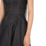 Close-up of Alexander McQueen cocktail dresses hardware and fine stitching