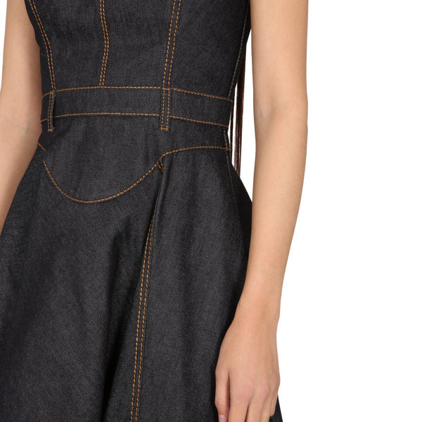 Close-up of Alexander McQueen cocktail dresses hardware and fine stitching