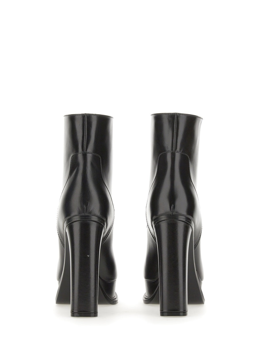 Close-up of Alexander McQueen boots & booties hardware and fine stitching
