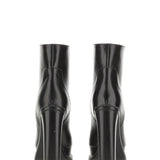 Close-up of Alexander McQueen boots & booties hardware and fine stitching