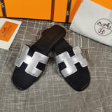 Hermès Tan Flat Thong Sandals - Sole Detail View