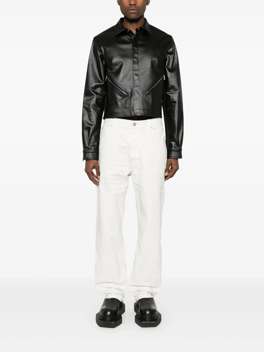 Close-up of Balenciaga pants hardware and fine stitching
